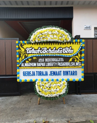 Papan Bunga Duka di Sukanegara